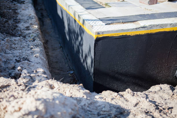 Professional Wet Basement Repair technician working in Jacksontown, OH